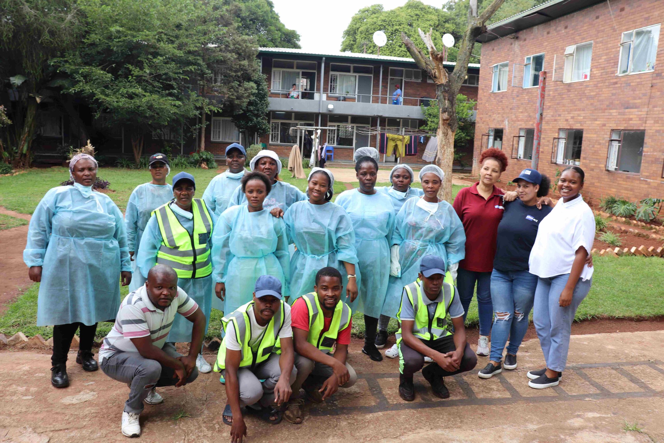 Linda Zondi (in maroon tshirt) with the community wellness team at Gordinia Mental Health Institute in Bertrams, Johannesburg.